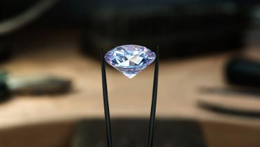 diamond in tweezers